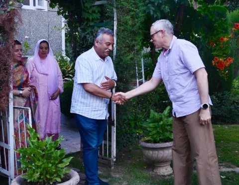 Meeting visitors in the garden